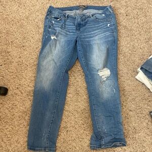 Torrid Blue Straight Leg Jeans with Distressed Details